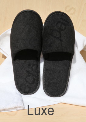 black hotel slippers